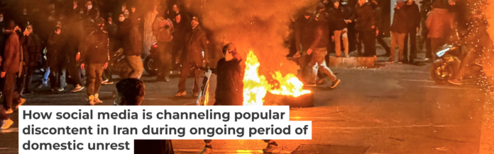 Iranians gather while blocking a street during a protest in Tehran on Jan. 9, 2026. MAHSA/Middle East Images/AFP via Getty Images